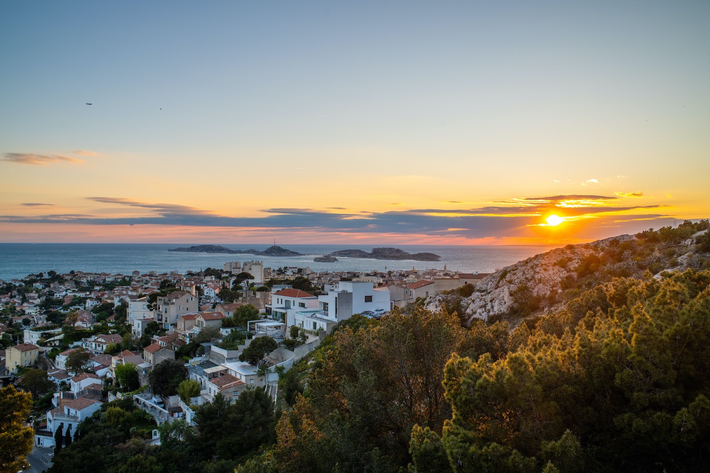 Panoramic sunset view over Marseille and the Mediterranean Sea from Notre-Dame de la Garde, France.