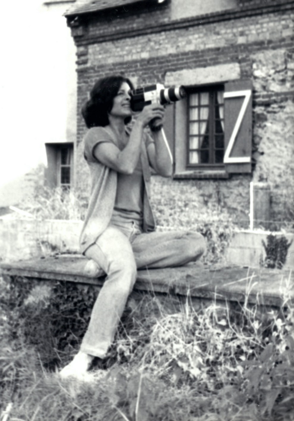 Stephan's mother Ziba filming with a Super 8 camera in France.